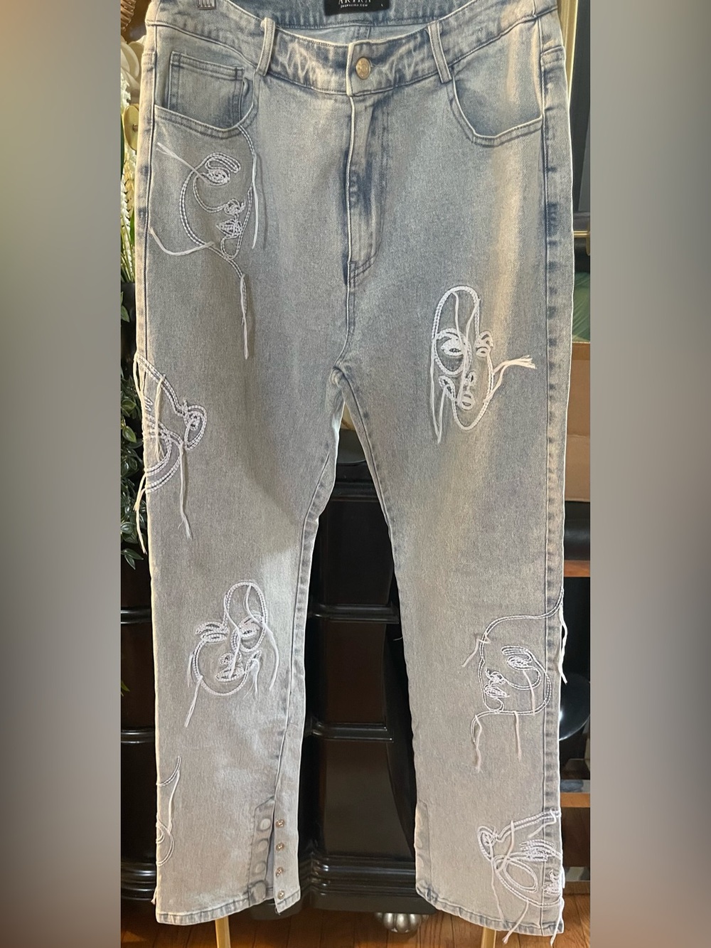 Akira art face denim jeans. NWOT